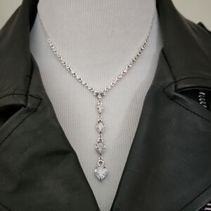 MONET Elegant Silvertone Drop Necklace with Heart Pendants
